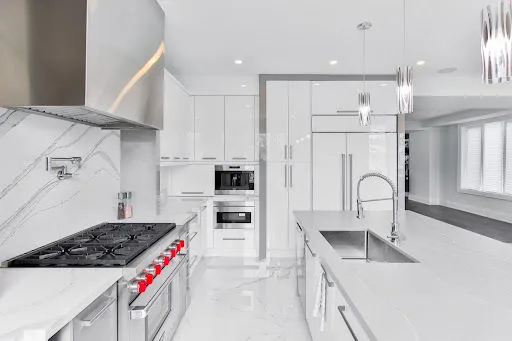 Glazed kitchen cupboard design for modular kitchen - Beautiful Homes
