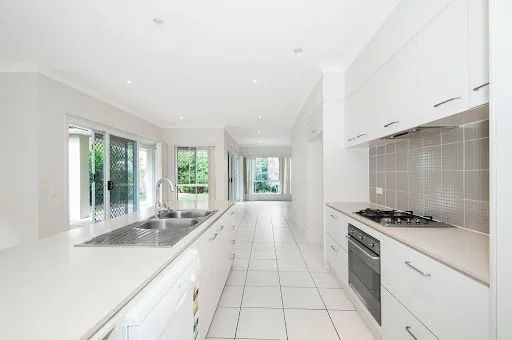 Acrylic kitchen cabinet design for your modular kitchen - Beautiful Homes