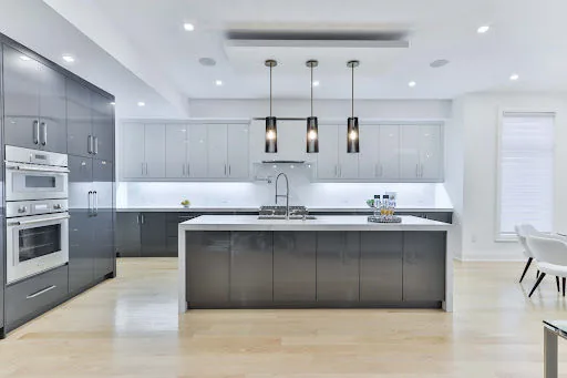 Glass finish kitchen cabinet design for your modular kitchen - Beautiful Homes