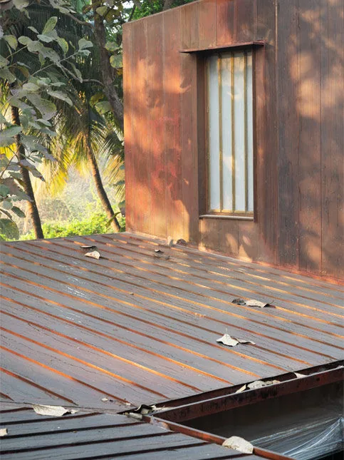 Copper House II copper cladding roof walls and window chajjas - Beautiful Homes